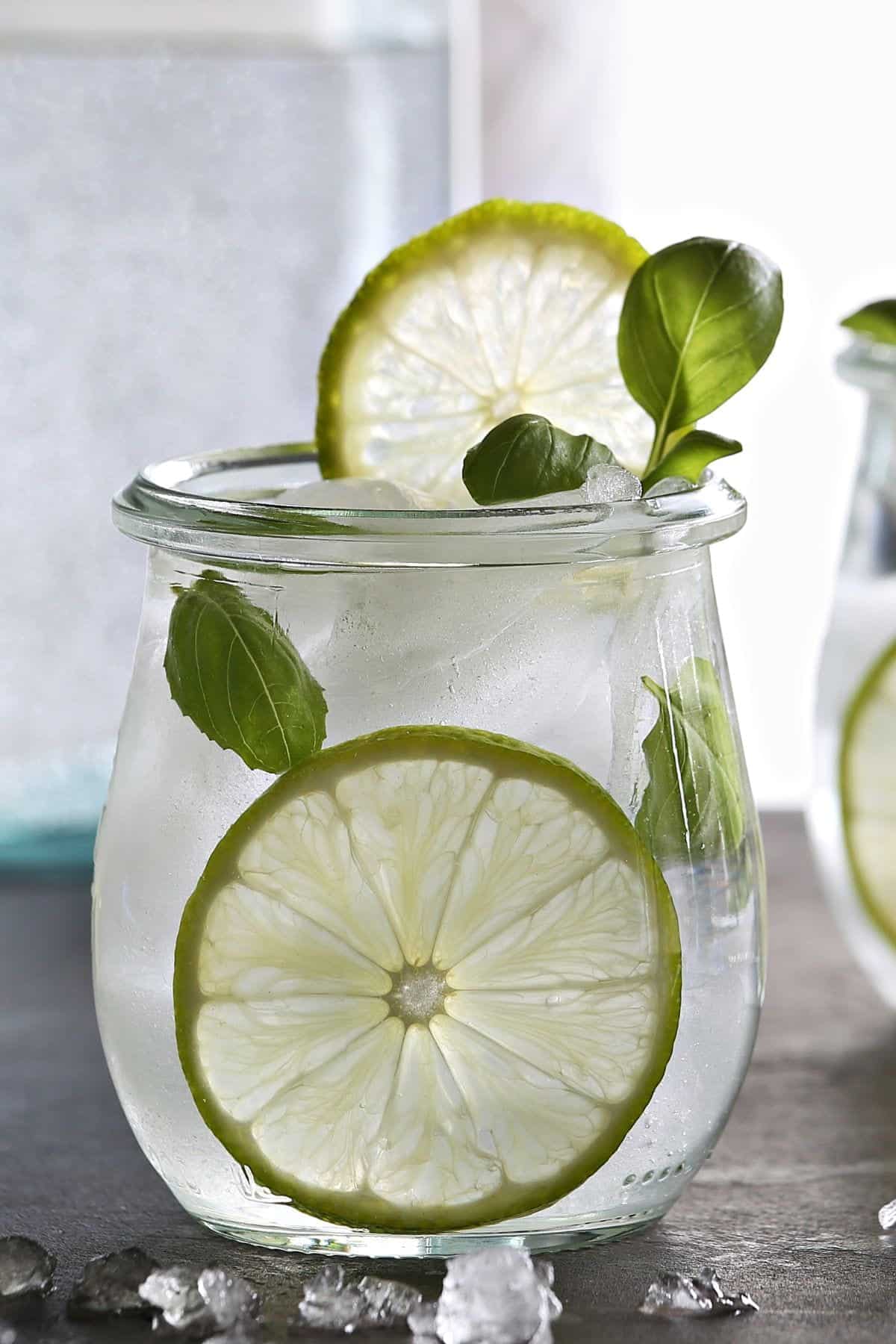 A glass of basil lime-infused water.