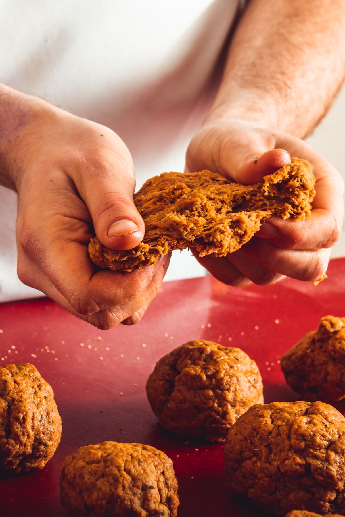 Seitan being torn into chunks.