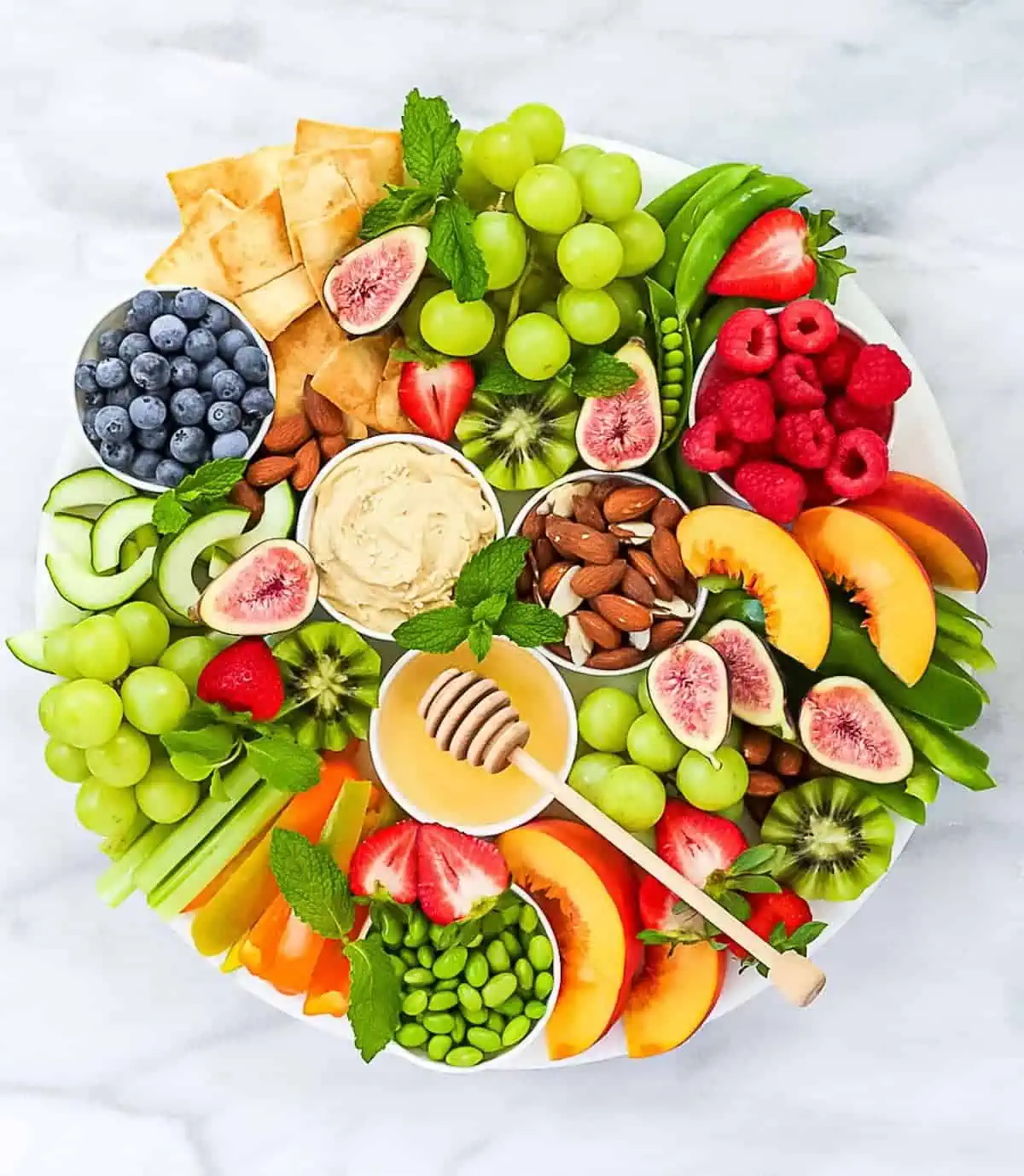 A colorful fruit charcuterie board.