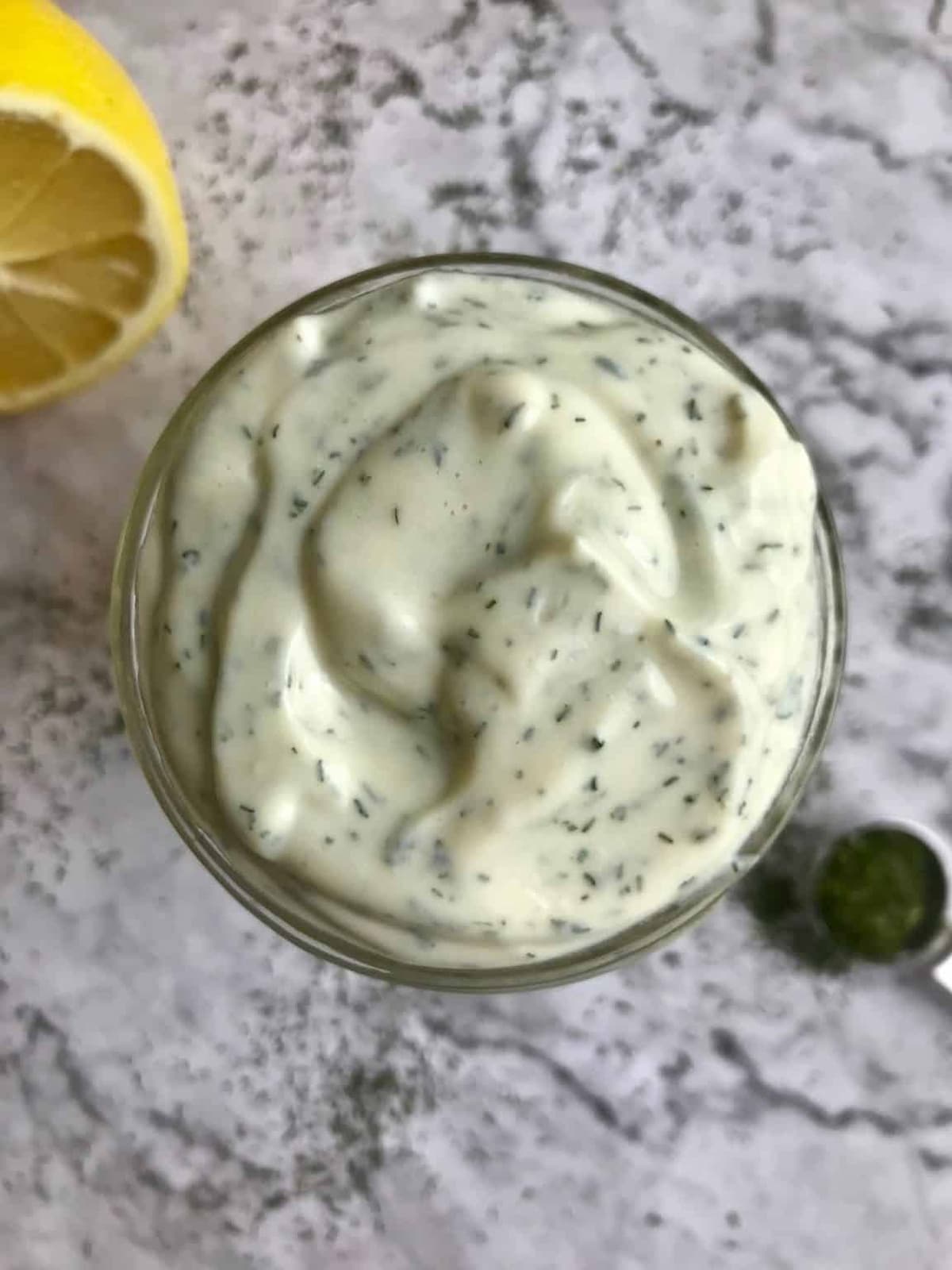 A jar of vegan sour cream made with silken tofu.
