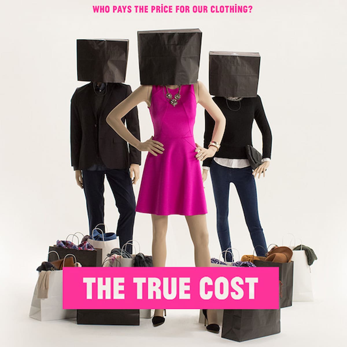 Three people with bags over their heads standing next to full shopping bags and text overlay "The True Cost."