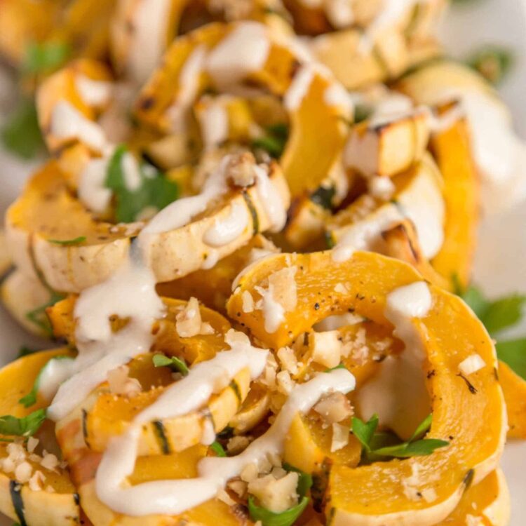 Roasted delicata squash with tahini drizzle.