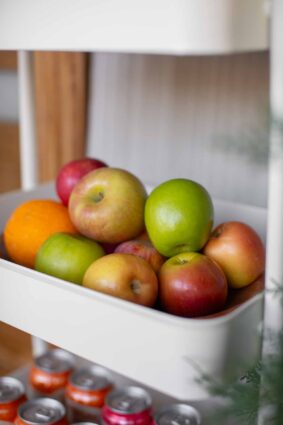 Apples in a holiday snack cart for delivery workers and mail carriers.