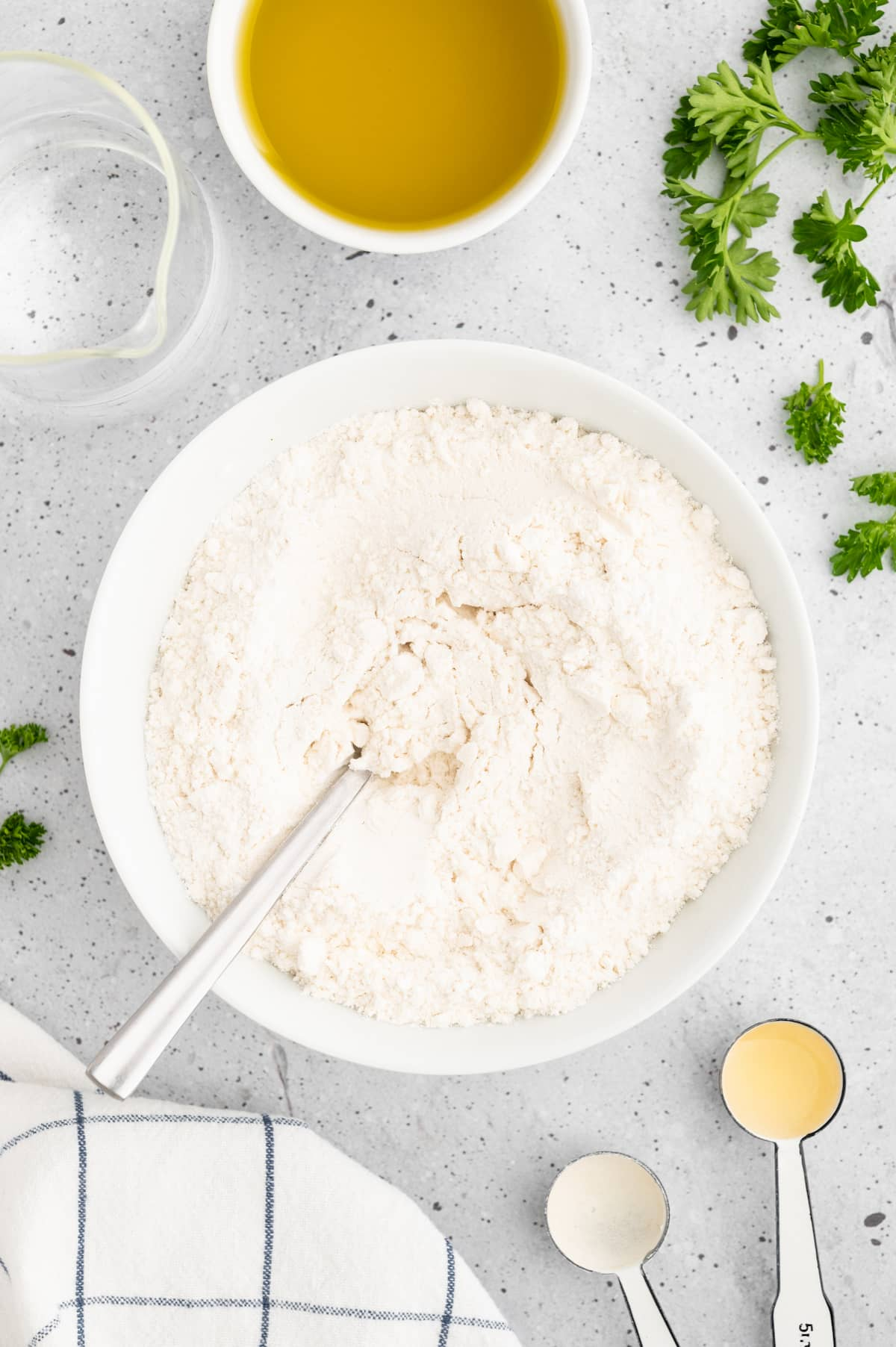 Dry dough ingredients mixed together in a bowl.