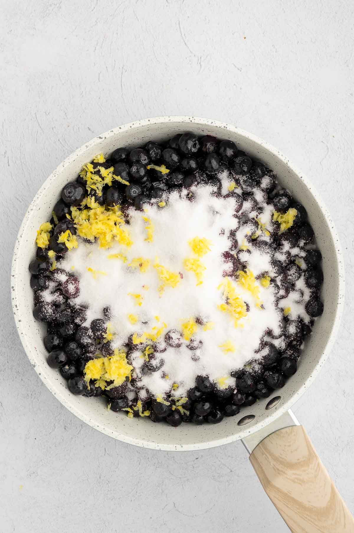 Blueberries, sugar, salt, vanilla extract, and lemon zest in a large saucepan.