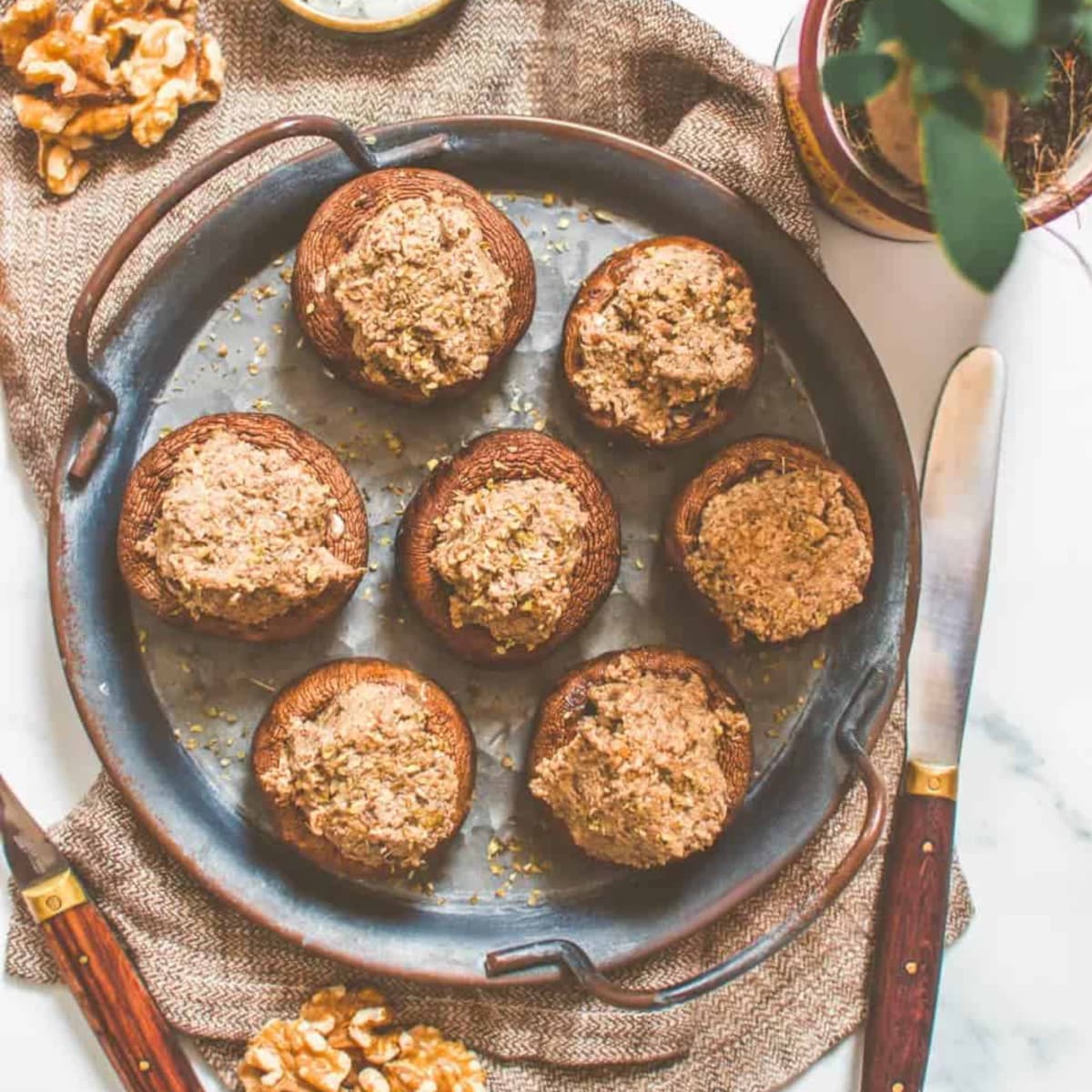 A platter of vegan stuffed mushrooms.