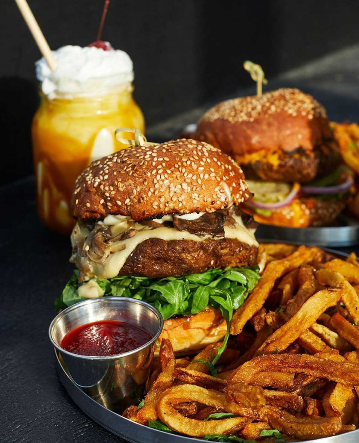 A vegan mushroom brie and modern love cheeseburgers from Modern Love in New York City.