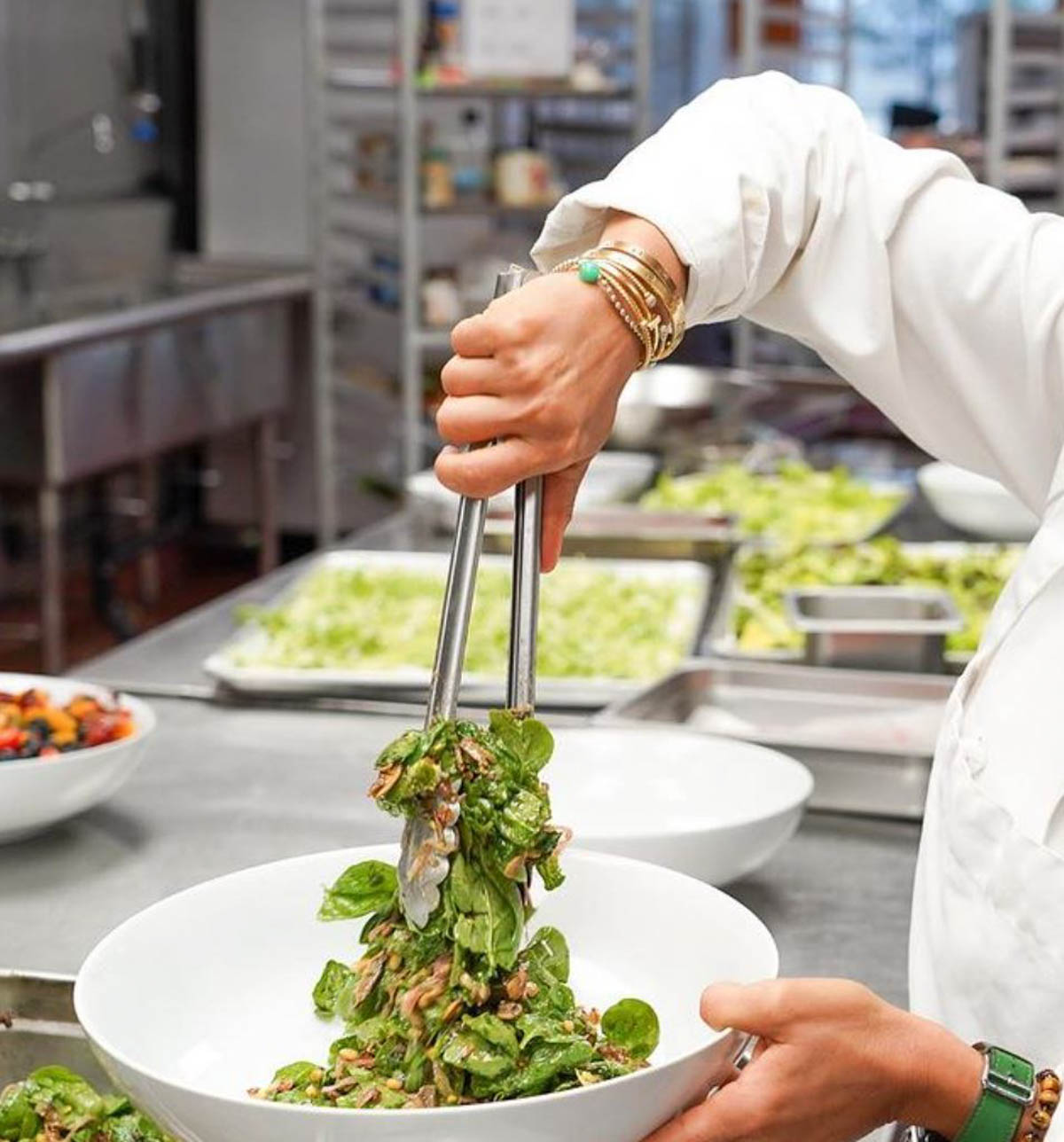 A salad being plated at The Institute of Culinary Education.