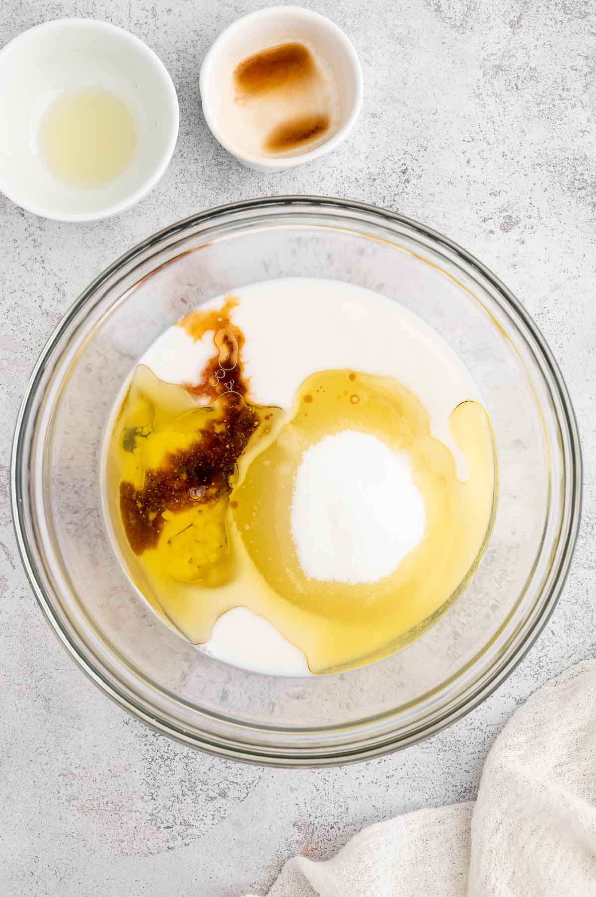 Ingredients for a vegan coffee cake being prepped in a bowl.