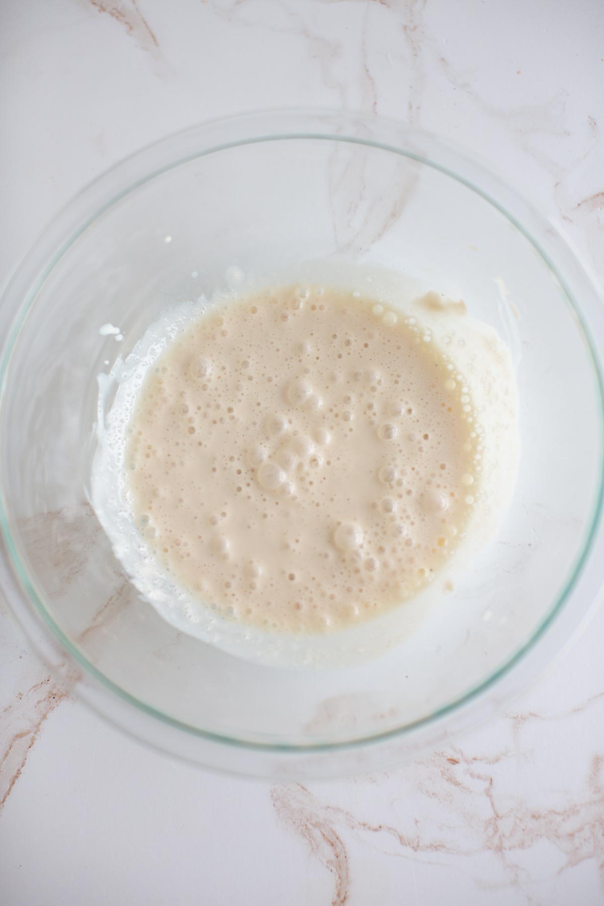 First stage of batter for vegan bundt cake in a bowl.