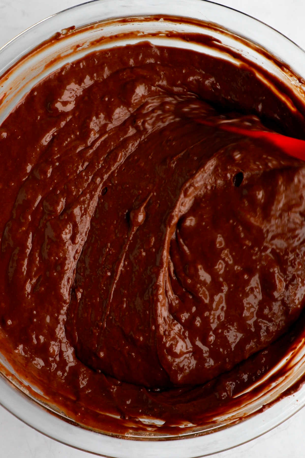 Mixing together the batter for this vegan chocolate cake recipe.