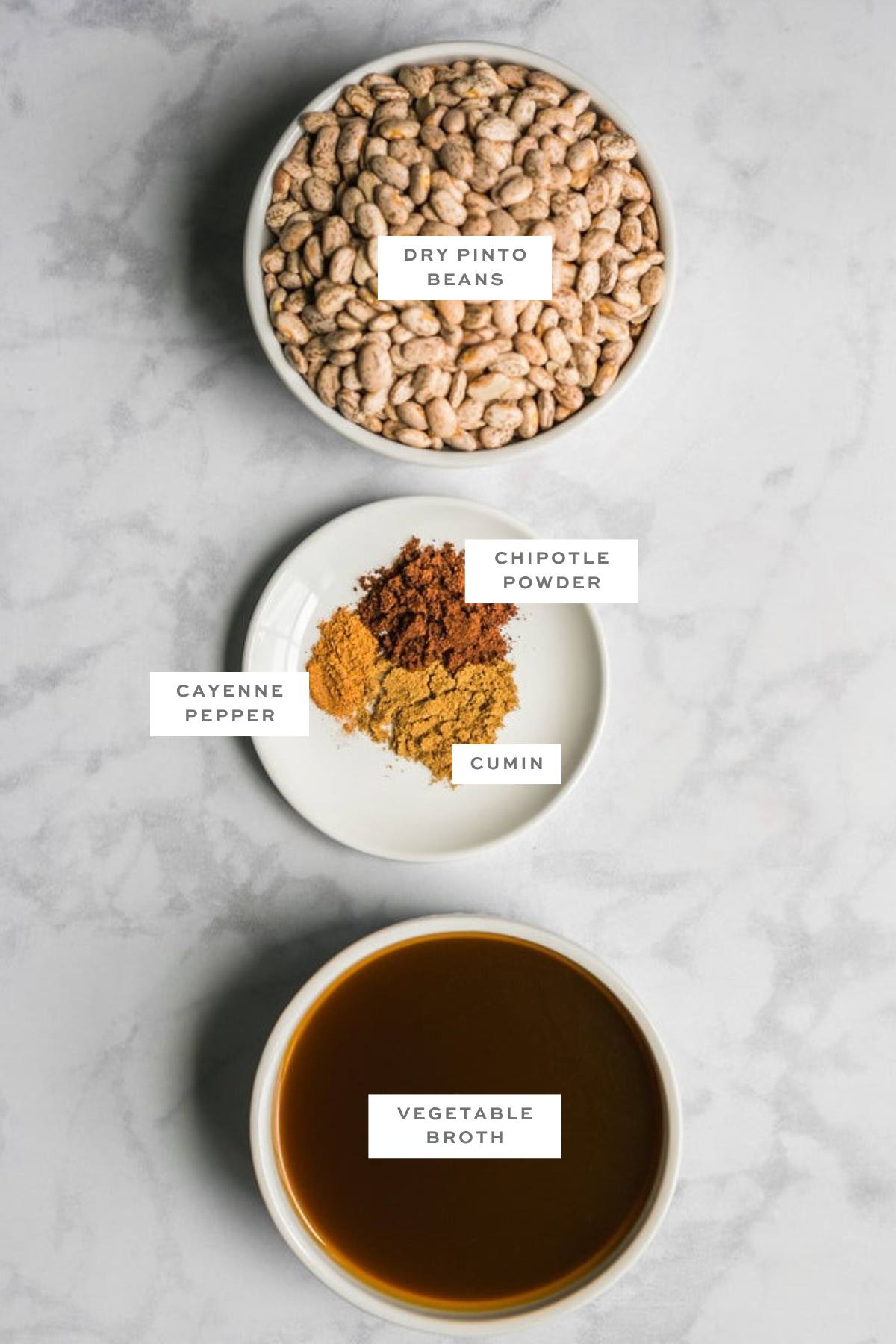 Gathered ingredients for this vegan instant pot refried beans recipe with labels.