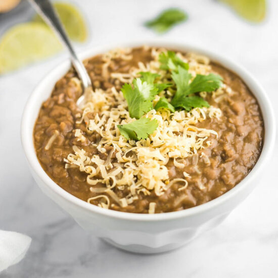 Easy Instant Pot Refried Beans Recipe in a serving bowl.