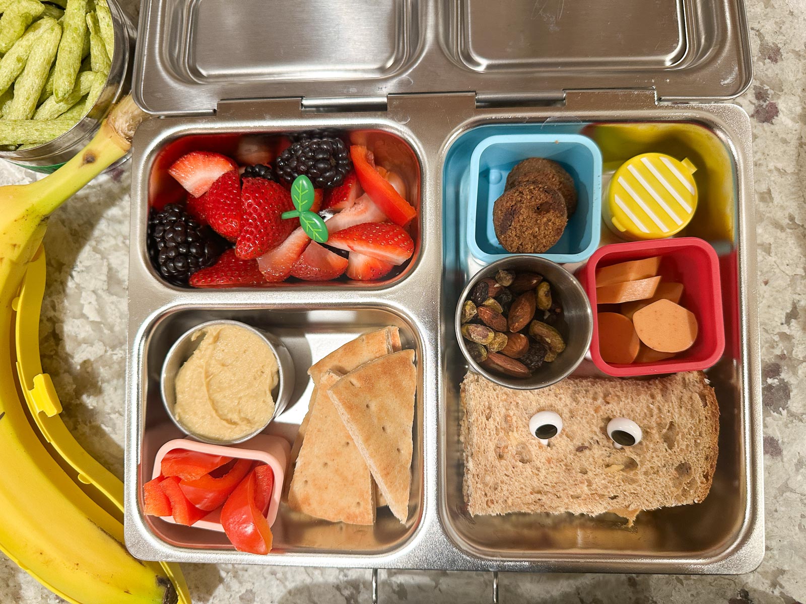 Preschool lunchbox filled with balanced vegan snacks and meals.