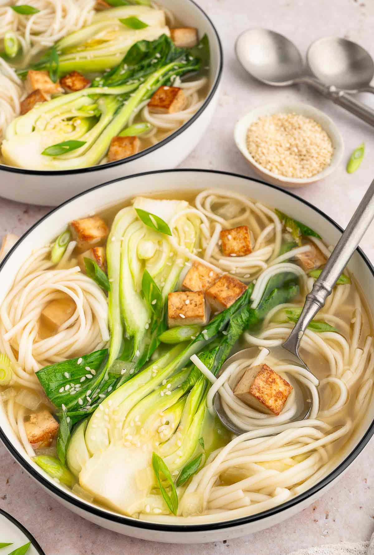 Boy choy soup with noodles and tofu.