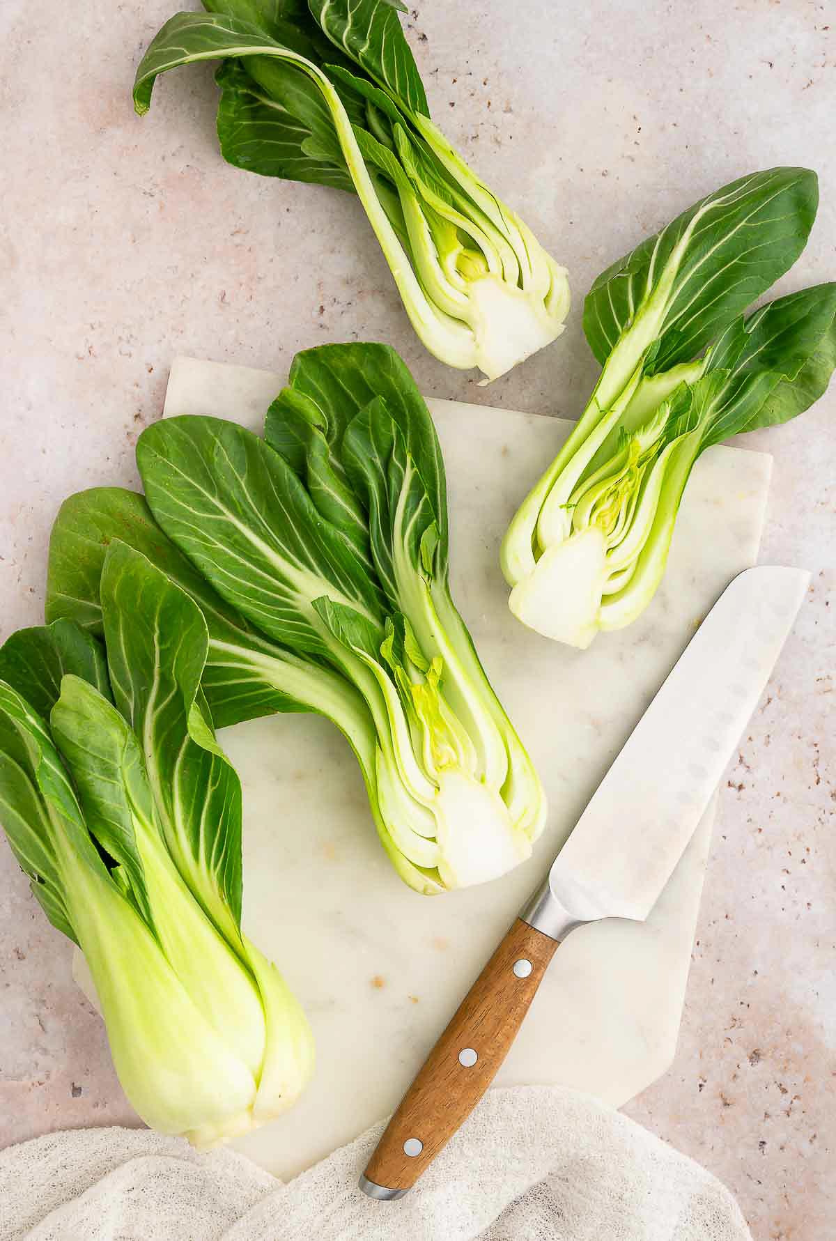 Sliced bok choy on a tabletop.