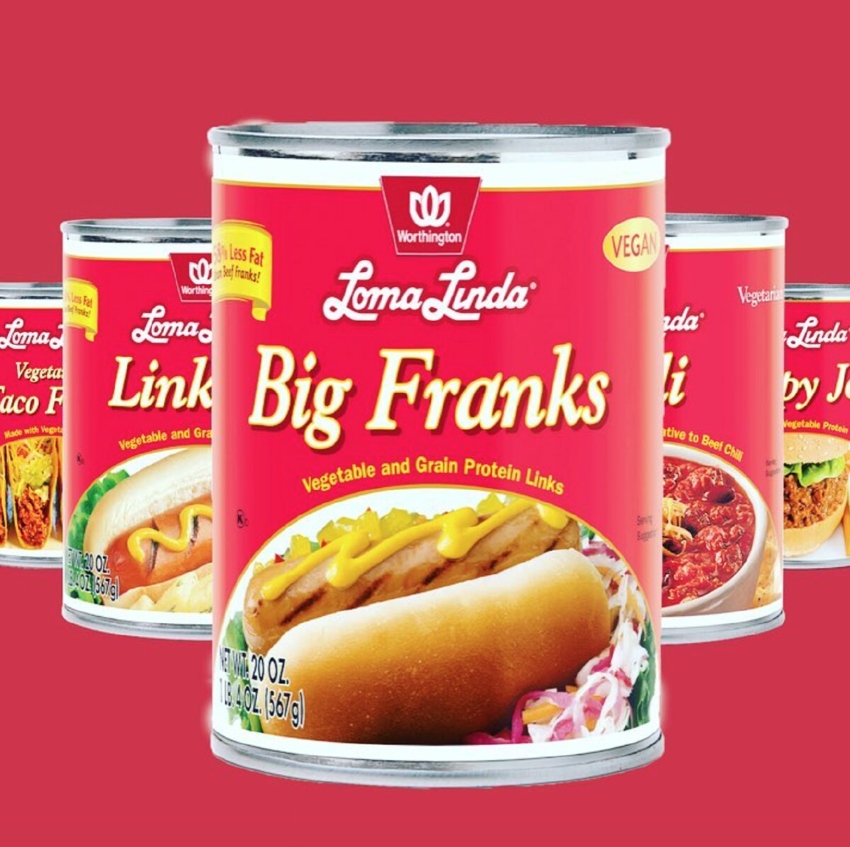 Red labeled cans of Loma Linda vegan pork products against a red background.