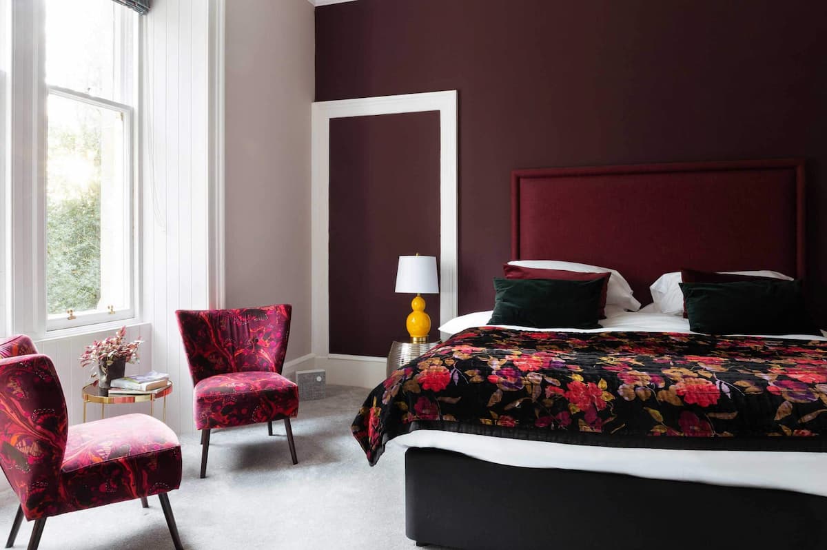 A boutique bedroom suite in the Saorsa 1875 vegan hotel in the Scottish Highlands, UK.