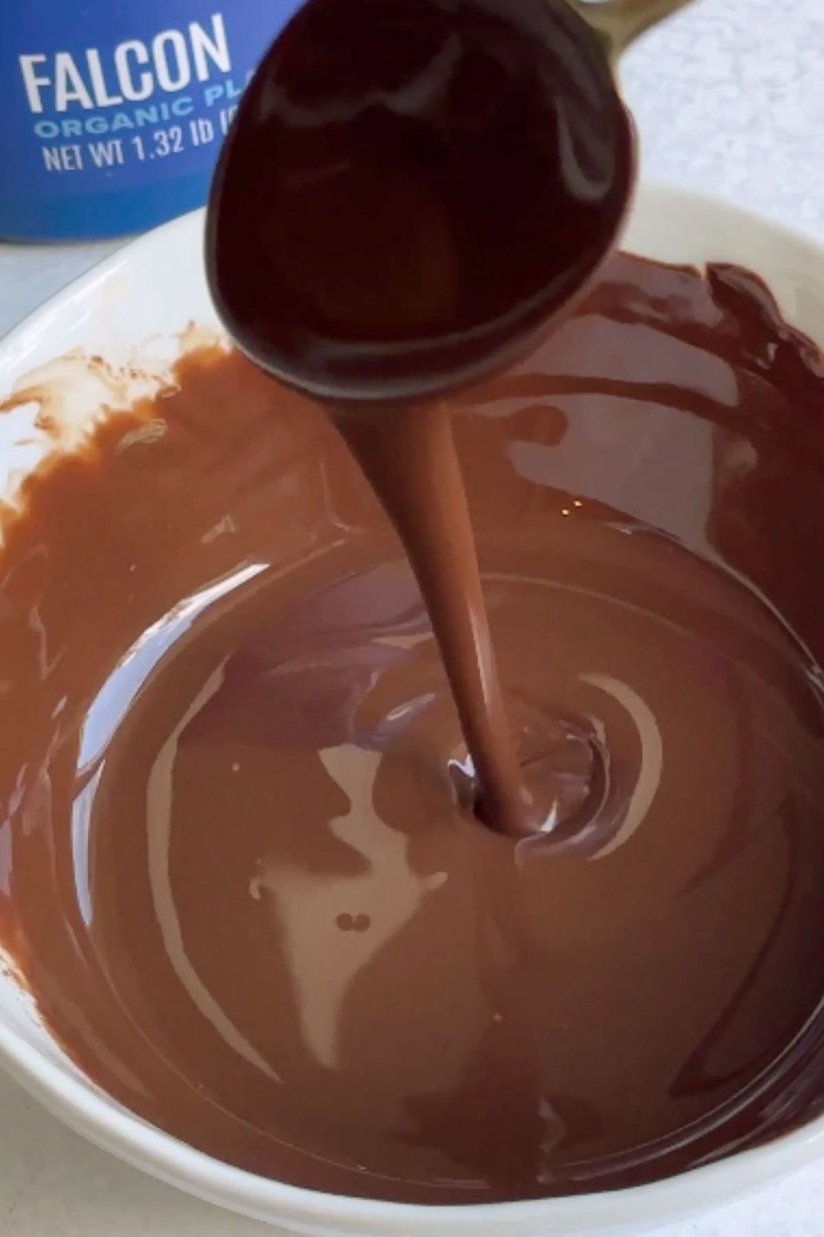 A ribbon of melted vegan chocolate.