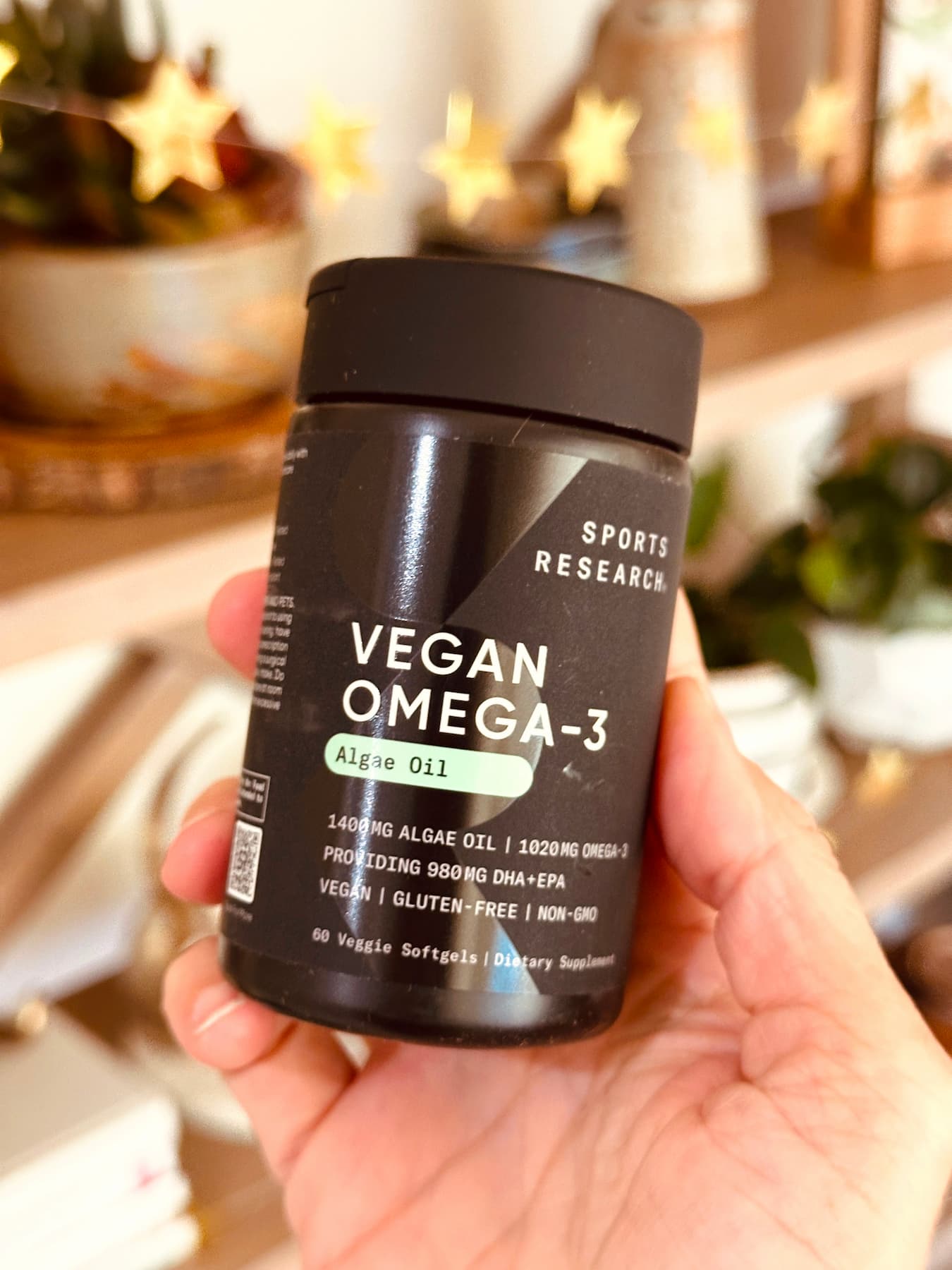 hand holding terraseed's vegan omega supplement