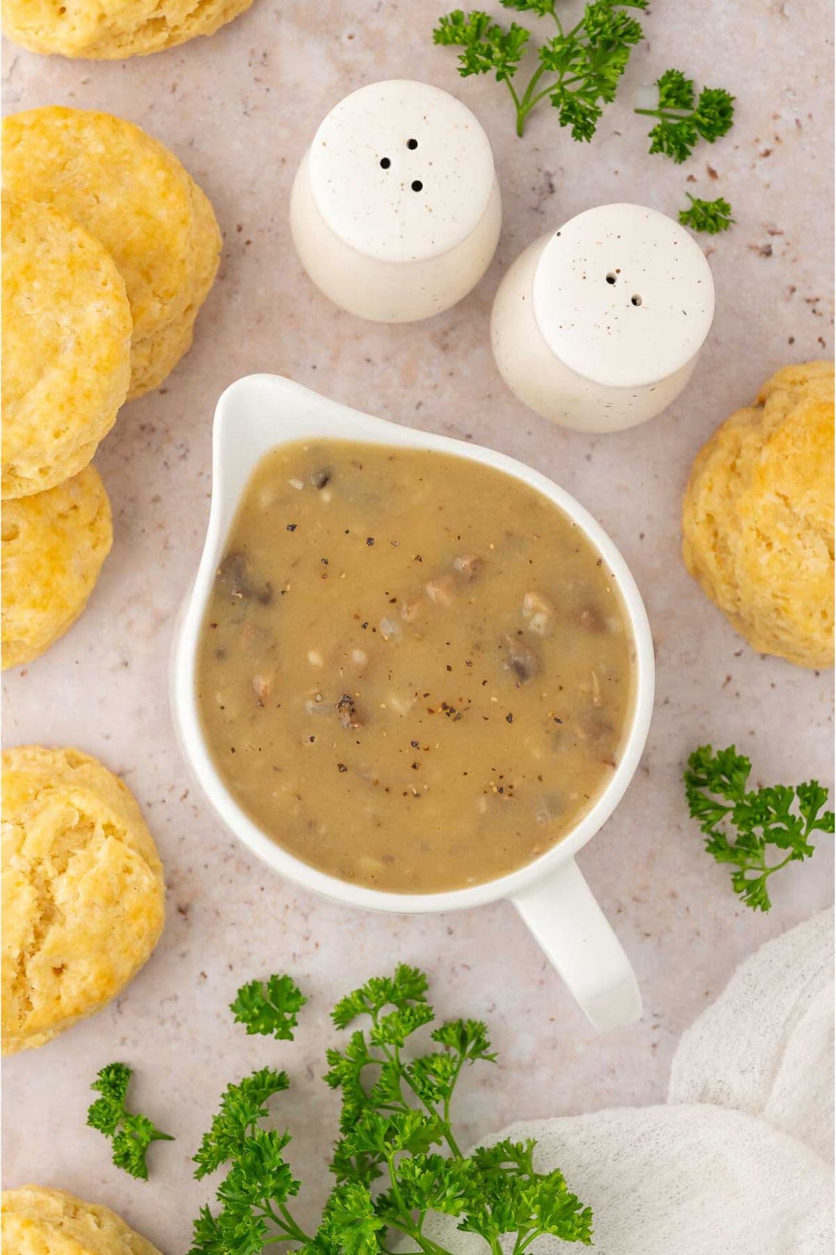Vegan mushroom gravy in a white serving vessel.