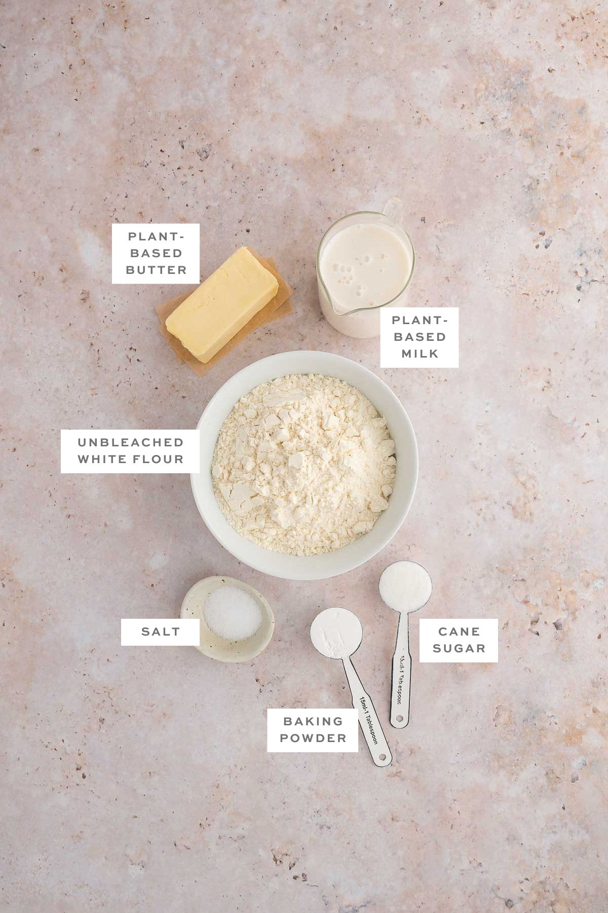 Key ingredients for vegan biscuits with labels.