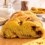 A sliced loaf of vegan cinnamon challah.