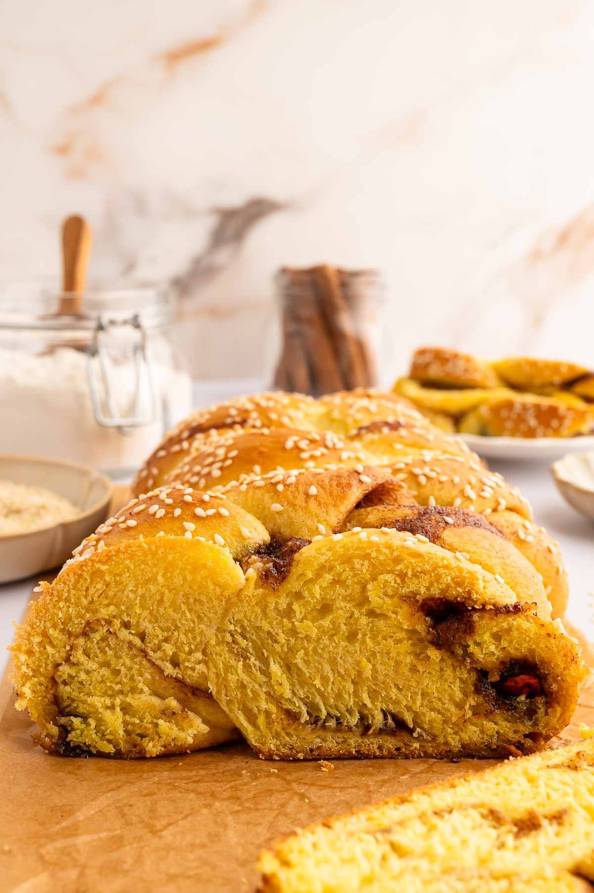 A bowl of vegan chicken noodle soup with chickpeas and herbs–a cozy Rosh Hashanah starter or main.