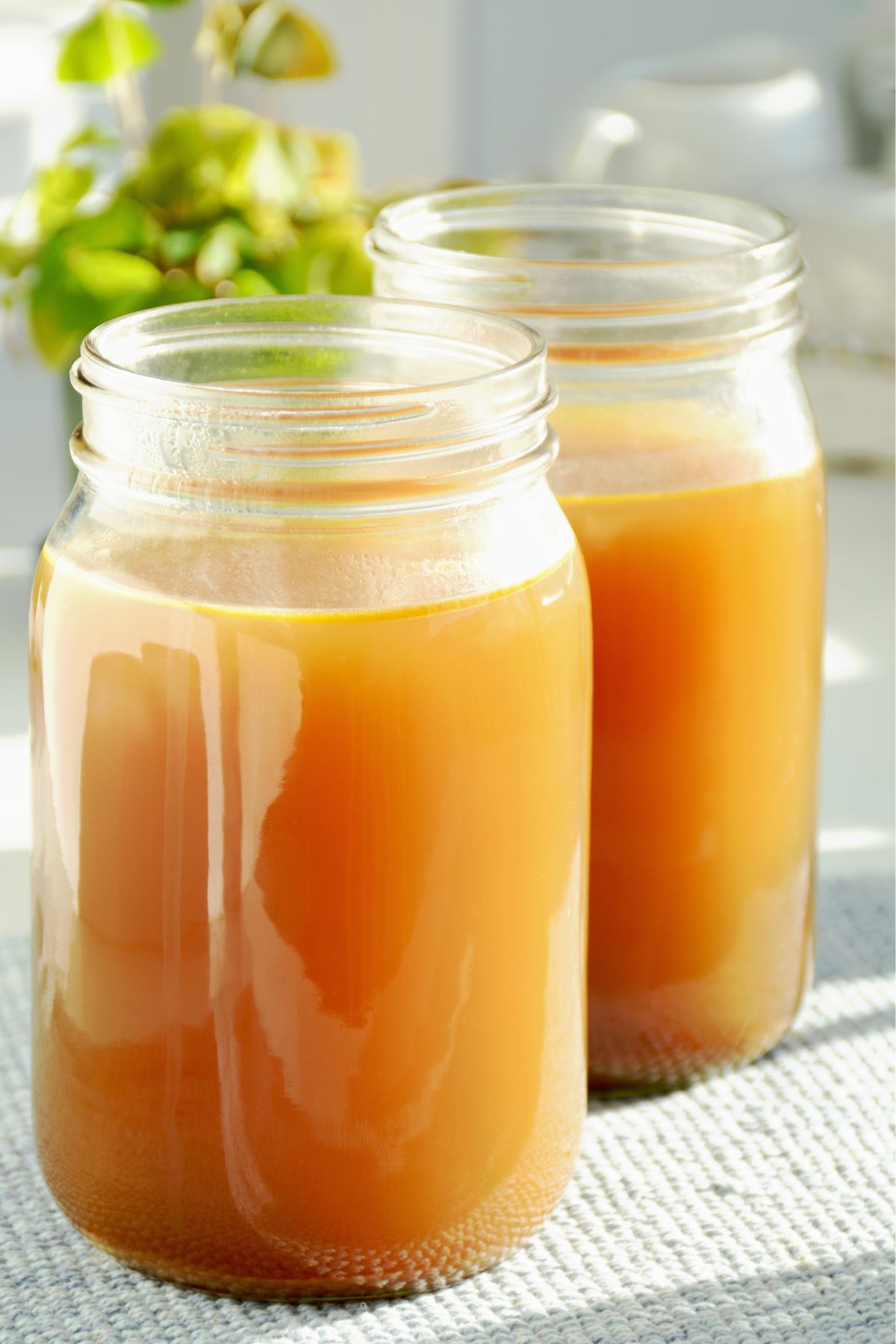 Vegan broth in mason jars.