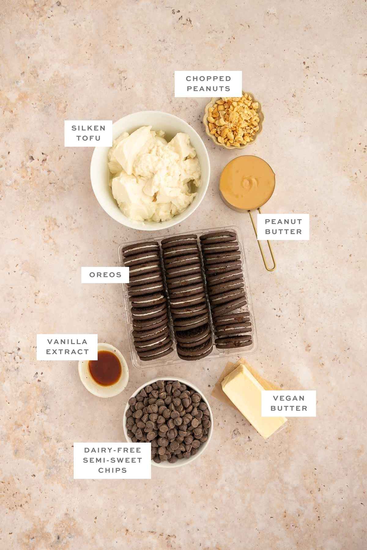 Ingredients for vegan chocolate peanut butter pie with labels.