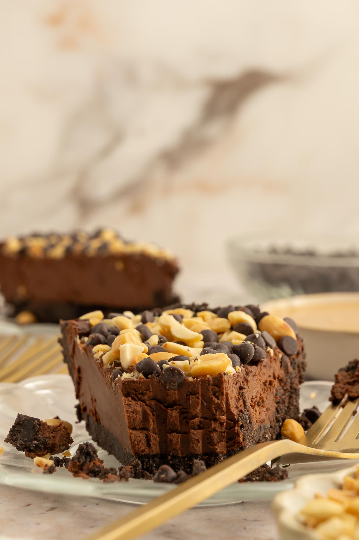 A slice of vegan chocolate peanut butter pie.