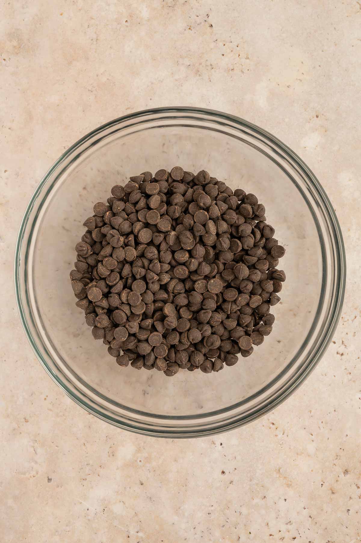 Vegan chocolate chips in a bowl.
