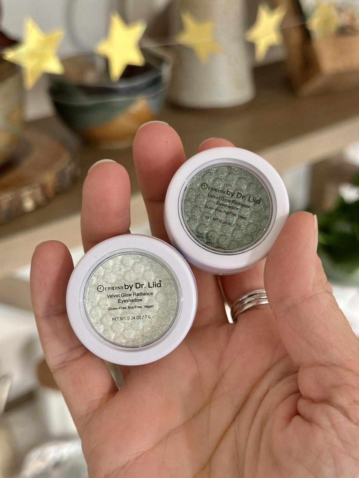hand holding vegan eyeshadow by Epilynx by Dr. Liia