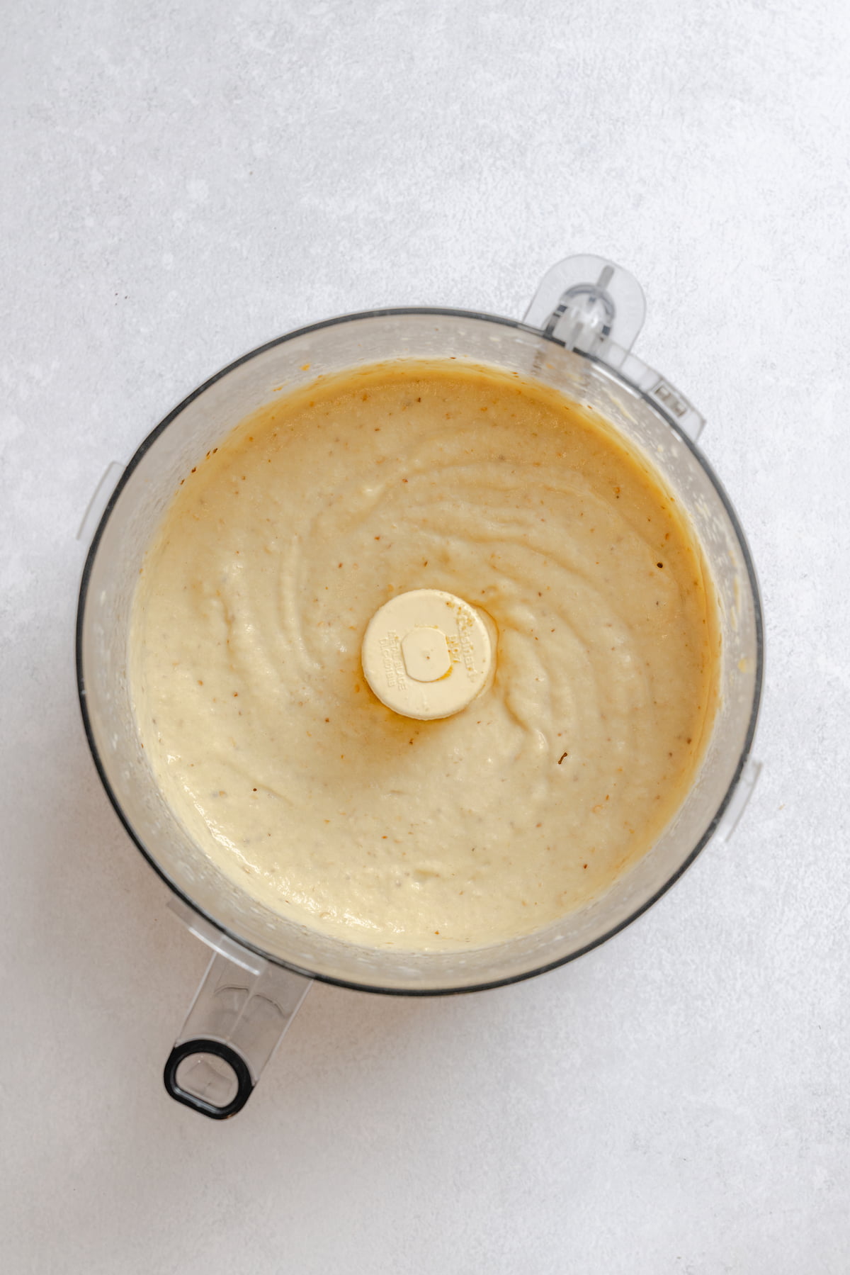 Roasted eggplant dip in a food processor, blended smooth.