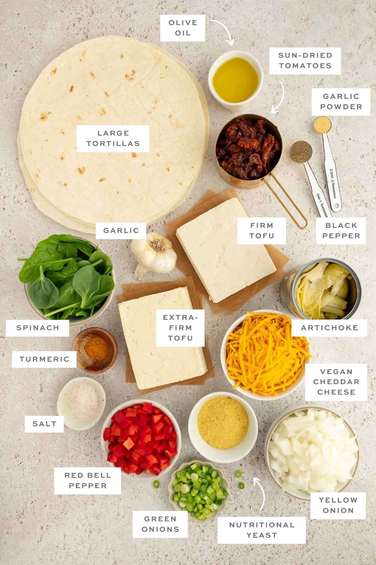 Gathered ingredients for the vegan breakfast burritos recipe measured out and labeled.