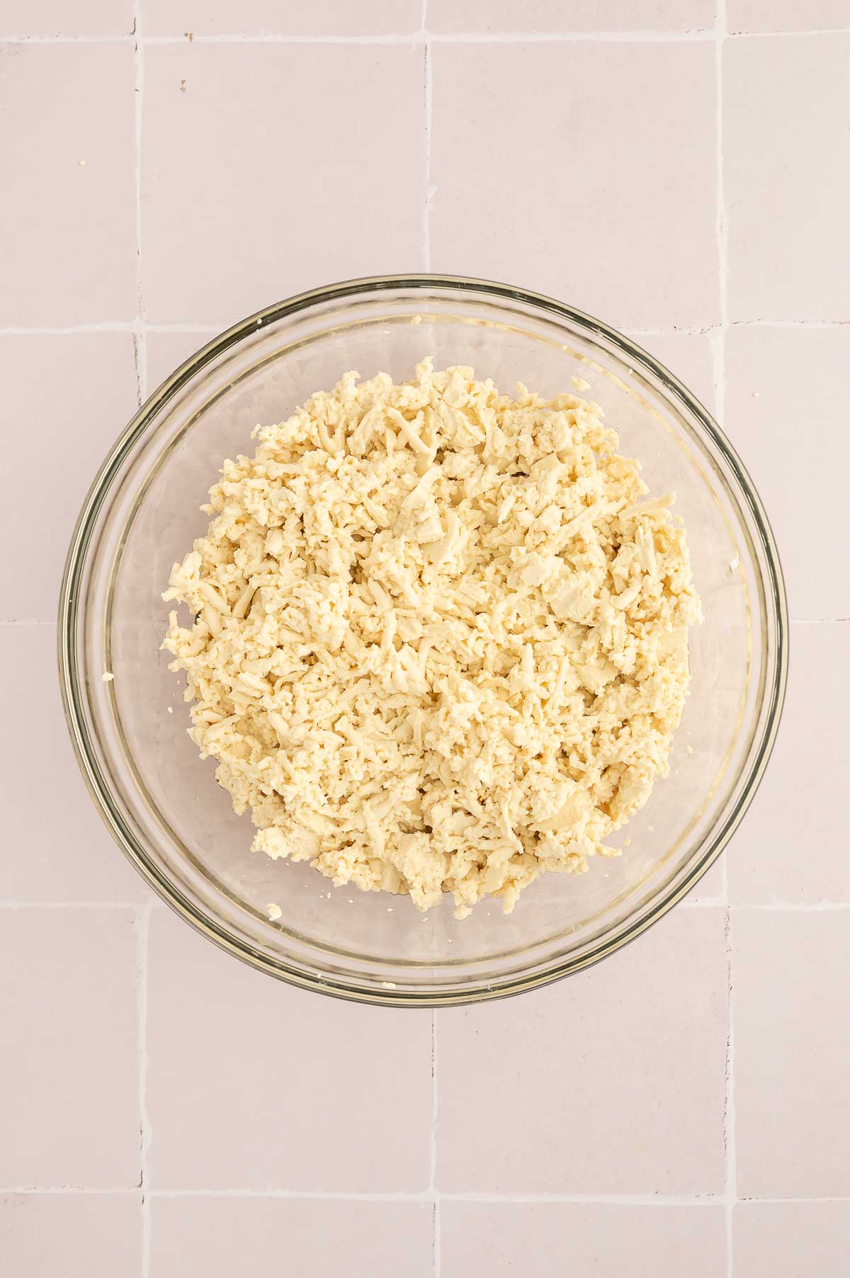 Shredded tofu in a large mixing bow.