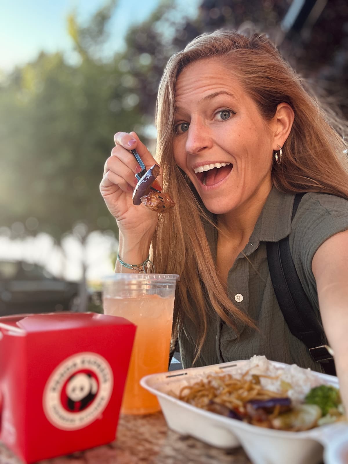 Michelle Cehn enjoying vegan-friendly Eggplant Tofu at Panda Express 