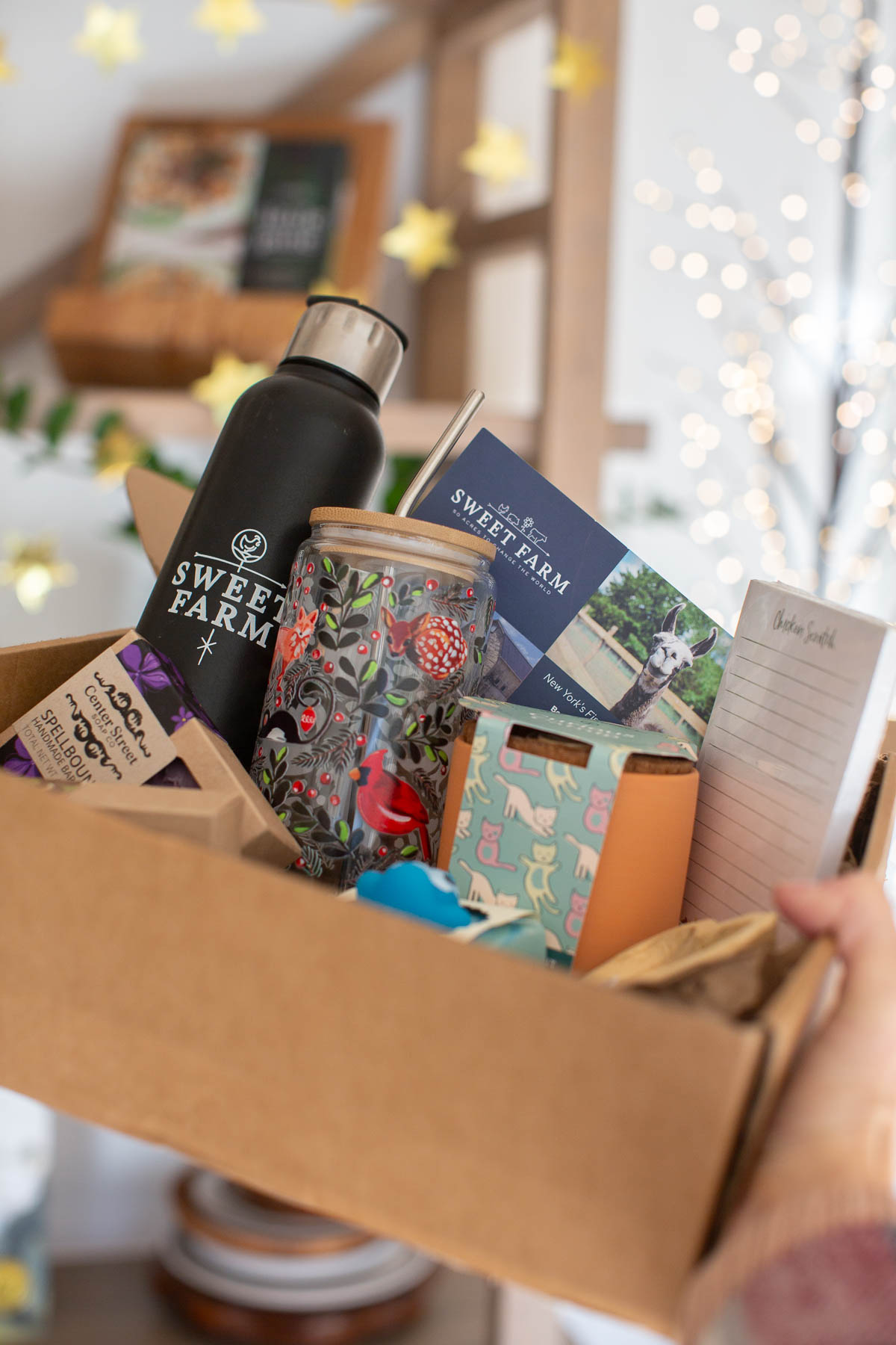 A box of presents from Sweet Farm Provisions animal sanctuary online gift shop.