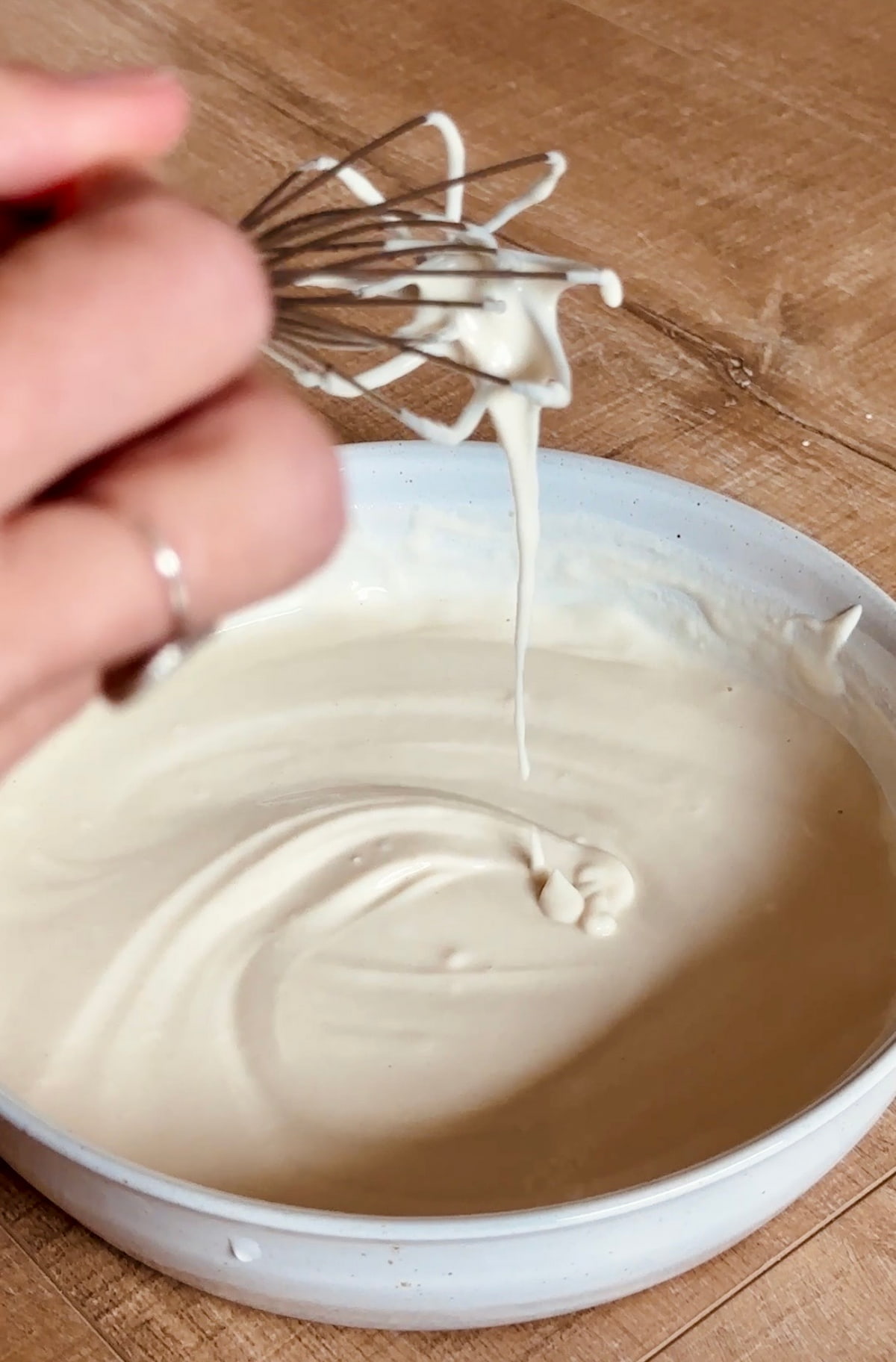 Mixing up dredge for a vegan fried chicken recipe with tofu.